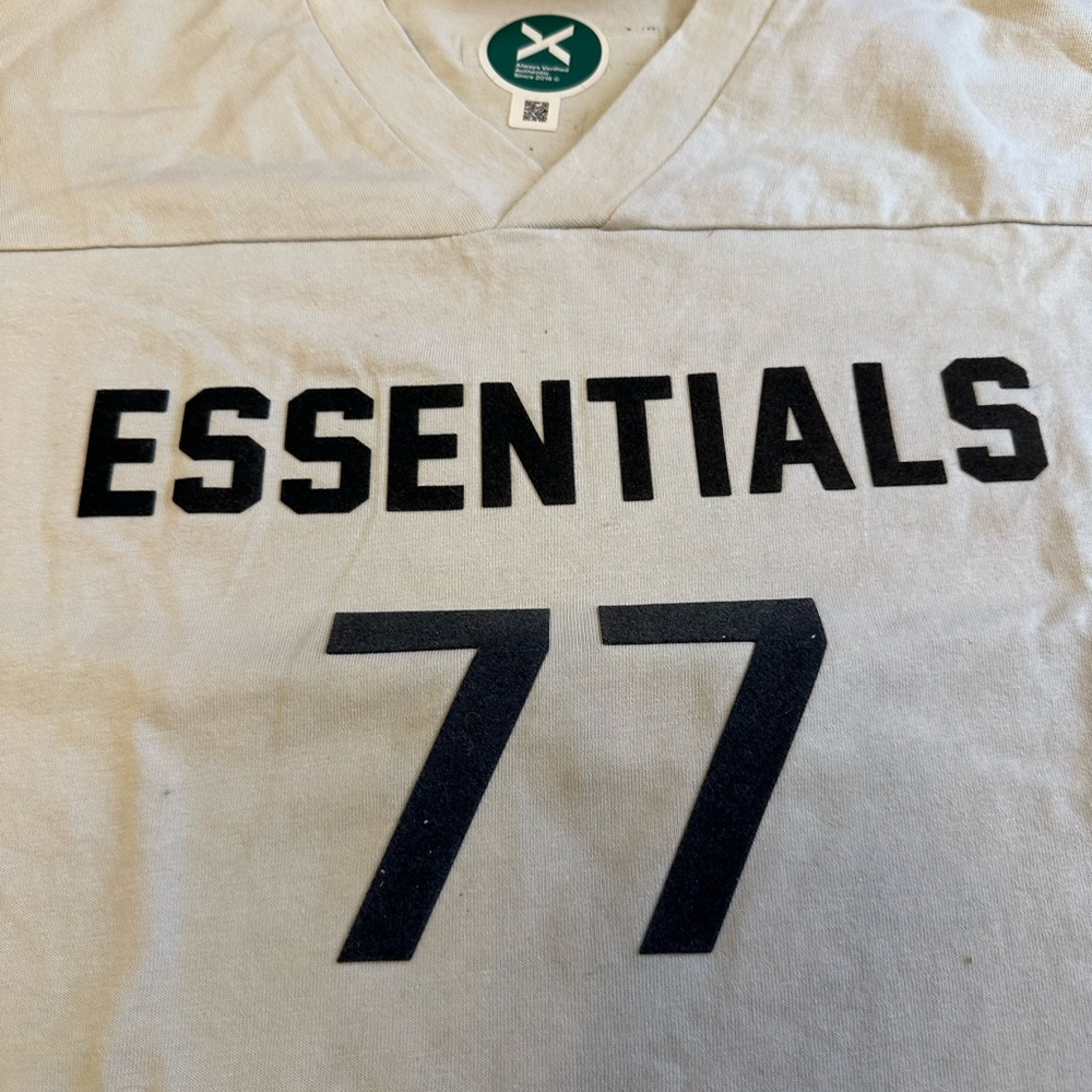 Essentials Fear Of God youth football t-shirt, beige. Size 12.